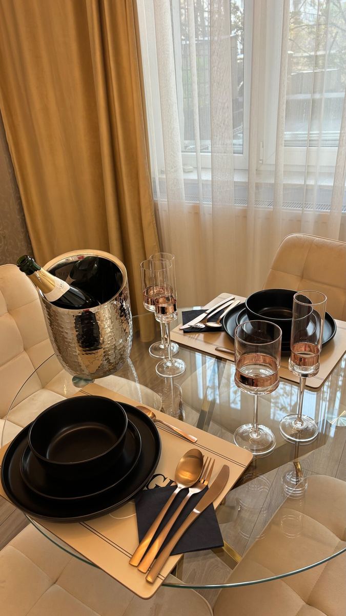 Champagne and glasses set on the table